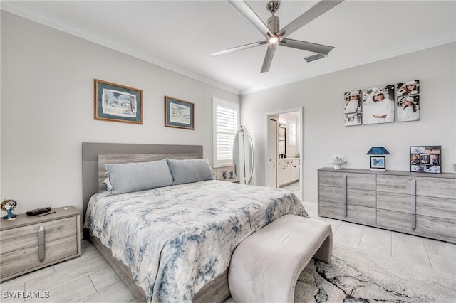 bedroom with crown molding, connected bathroom, and ceiling fan