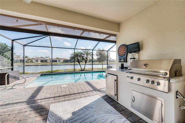 view of swimming pool with a water view, grilling area, a lanai, and area for grilling