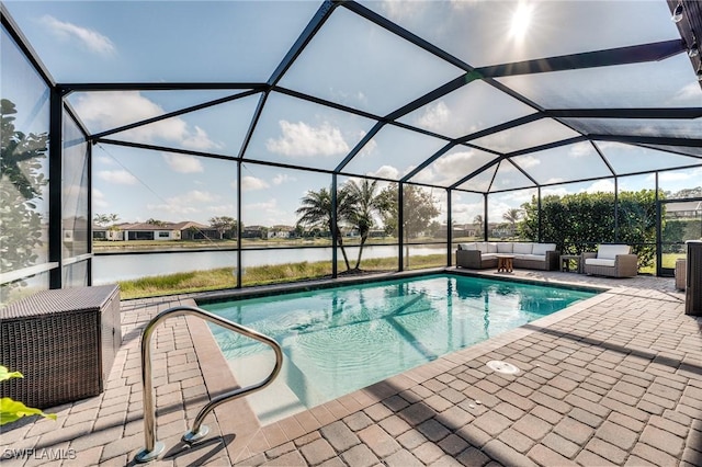 view of swimming pool featuring a water view, an outdoor living space, a lanai, and a patio