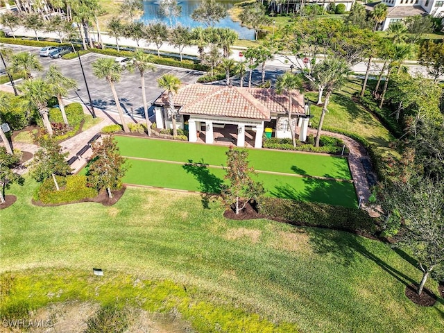 birds eye view of property featuring a water view