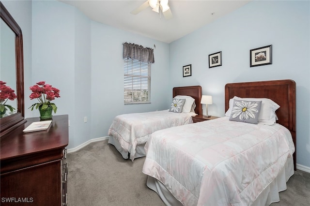 bedroom featuring ceiling fan and carpet floors