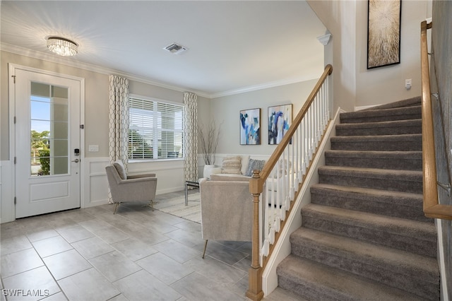 foyer with ornamental molding