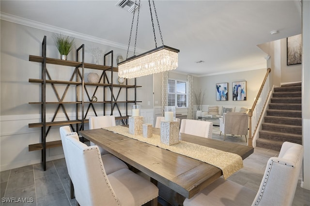 dining area with ornamental molding