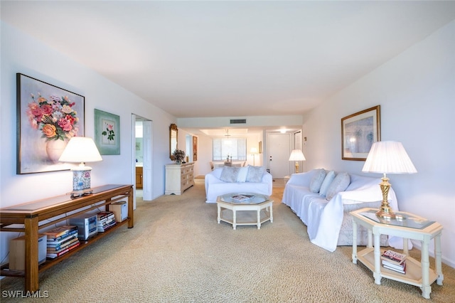 living room featuring carpet flooring