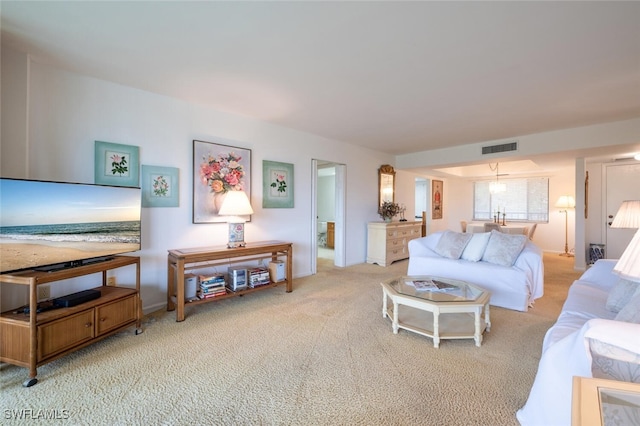 living room featuring light colored carpet