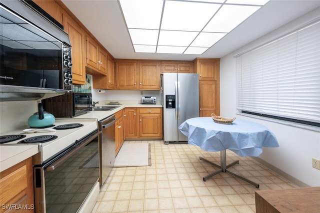 kitchen featuring sink and appliances with stainless steel finishes