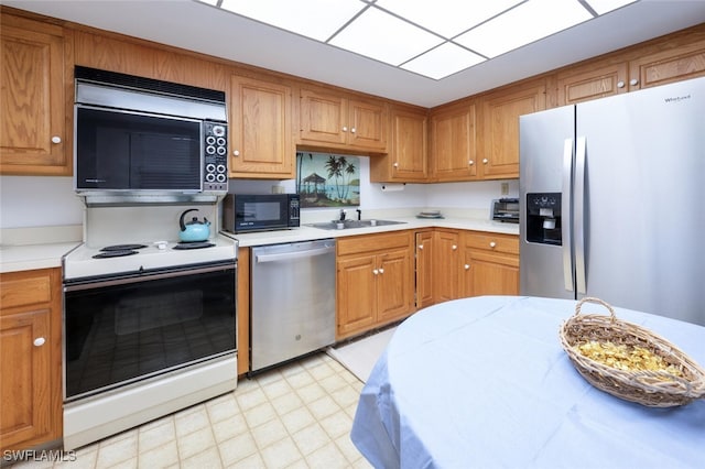 kitchen with sink and stainless steel appliances