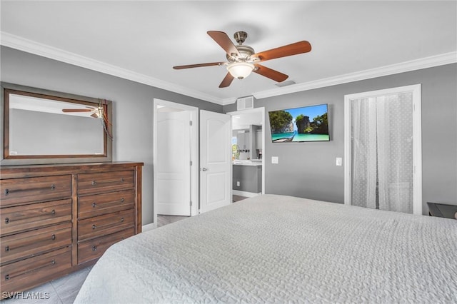 bedroom featuring ceiling fan, crown molding, and ensuite bath