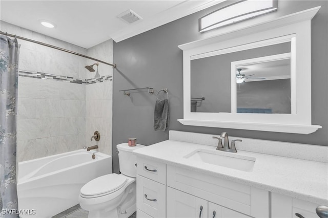 full bathroom with ornamental molding, shower / bath combo with shower curtain, toilet, and vanity