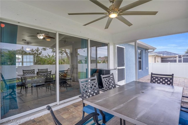 view of patio with ceiling fan