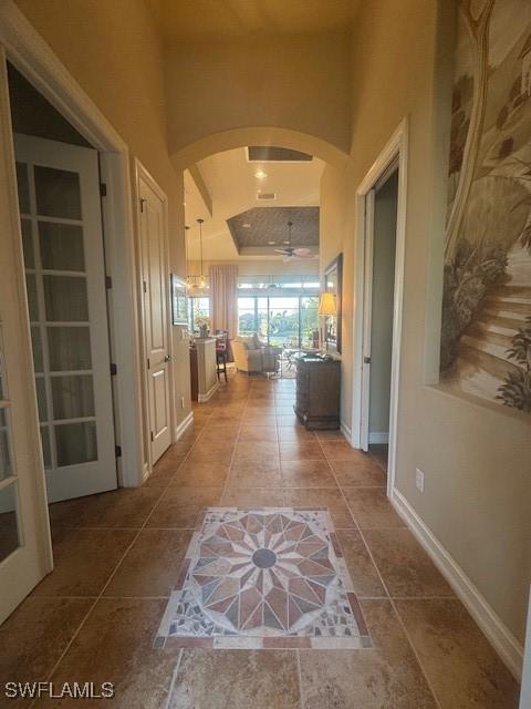 hallway featuring tile patterned floors