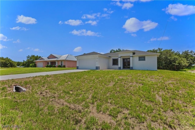 single story home featuring a garage and a front lawn