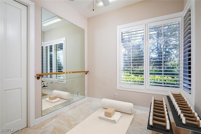 bathroom featuring ceiling fan