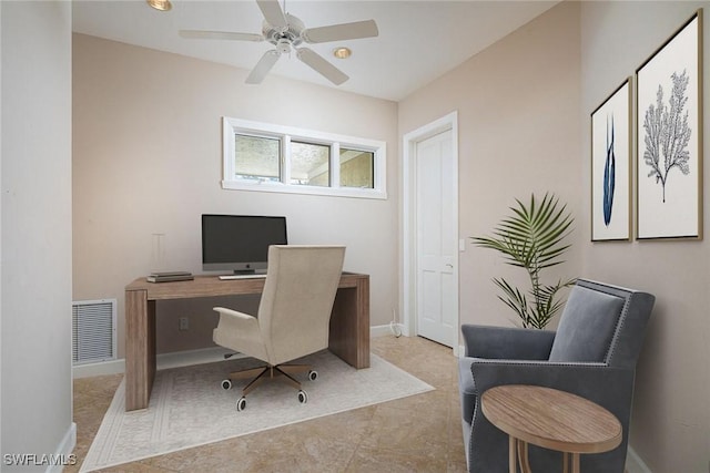 office space featuring light tile patterned floors and ceiling fan