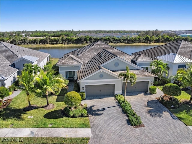 bird's eye view with a water view