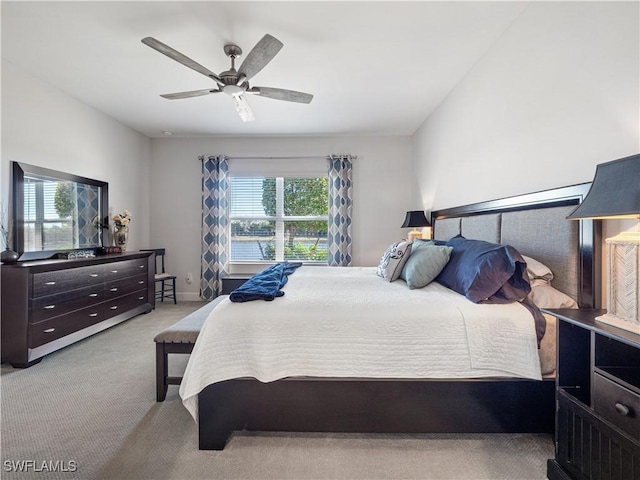 carpeted bedroom with ceiling fan