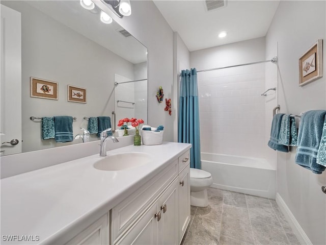 full bathroom with toilet, vanity, and shower / tub combo