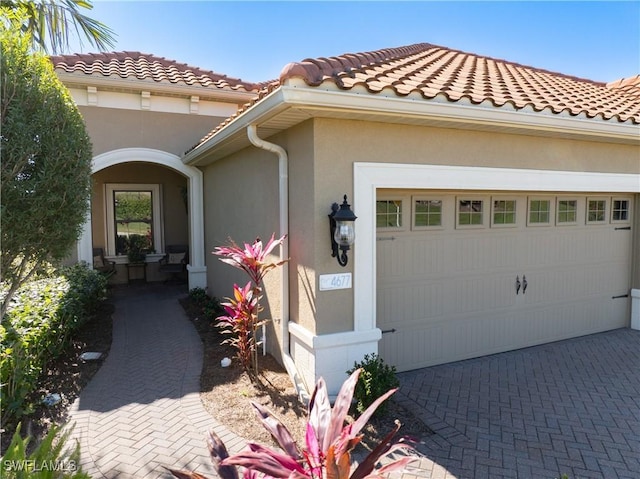 view of front of house with a garage