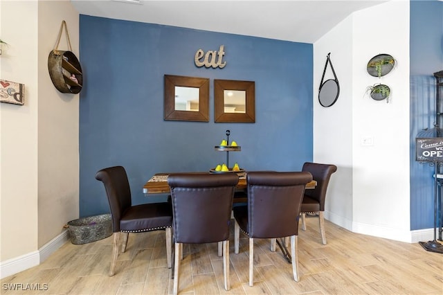 dining area featuring light hardwood / wood-style floors