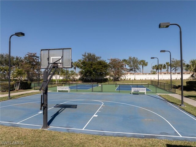 view of sport court with tennis court