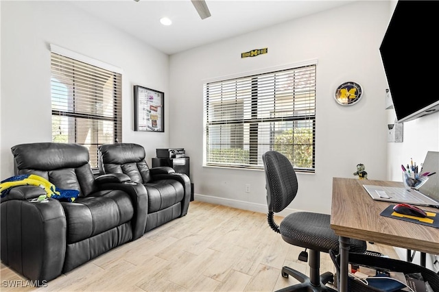 office area with light hardwood / wood-style floors