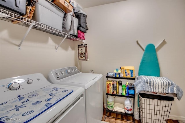 clothes washing area featuring washing machine and dryer