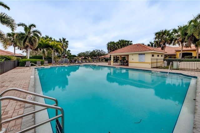 view of swimming pool featuring a patio area