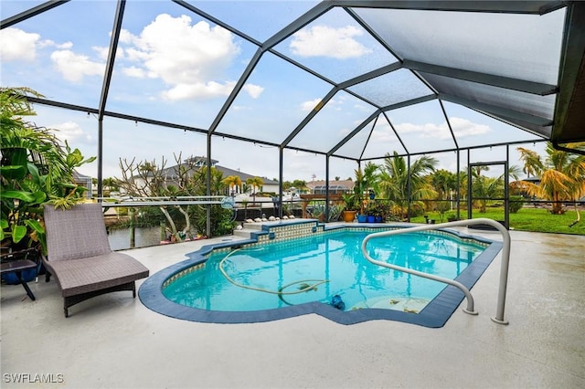 view of swimming pool featuring glass enclosure and a patio area