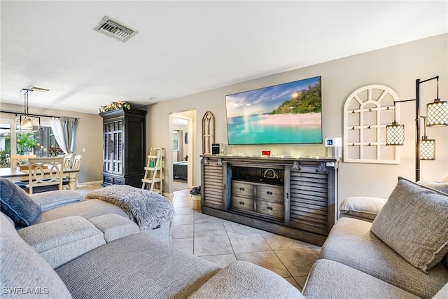 living room with light tile patterned flooring