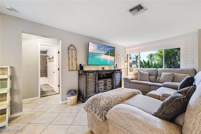 living room featuring light tile patterned floors