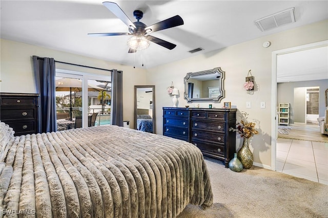 bedroom featuring light carpet, ceiling fan, visible vents, and access to exterior