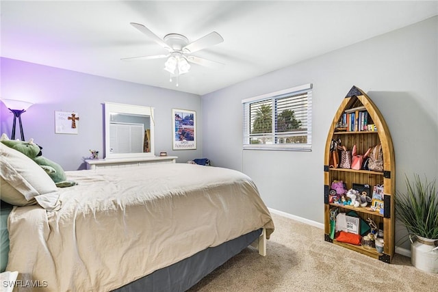 bedroom featuring ceiling fan and light colored carpet