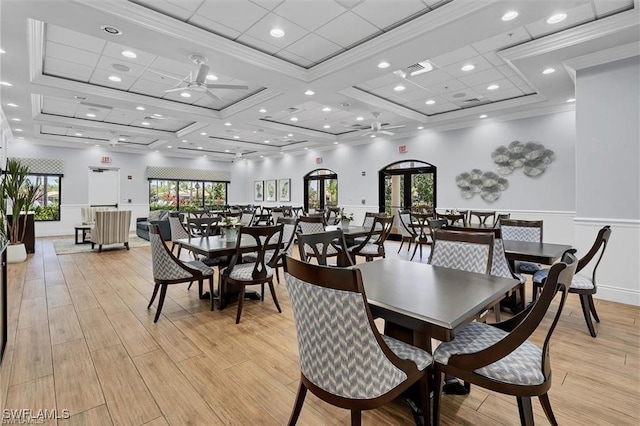 dining area with beam ceiling, coffered ceiling, ceiling fan, and ornamental molding