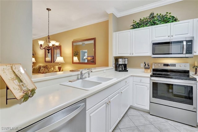 kitchen with sink, white cabinetry, light tile patterned flooring, ornamental molding, and stainless steel appliances