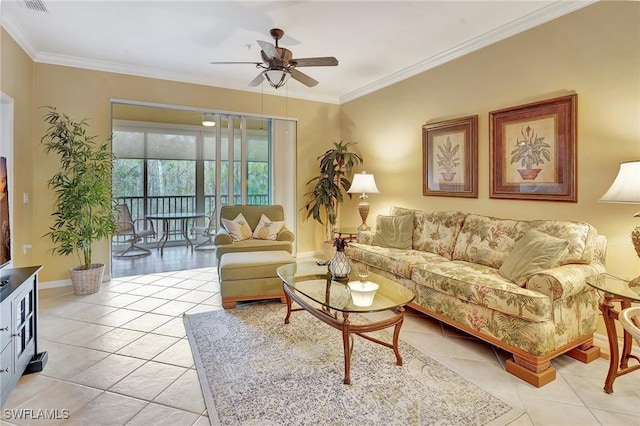 living room featuring ceiling fan, crown molding, and light tile patterned floors