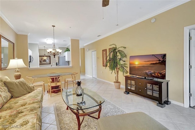 living room featuring an inviting chandelier, ornamental molding, and light tile patterned flooring