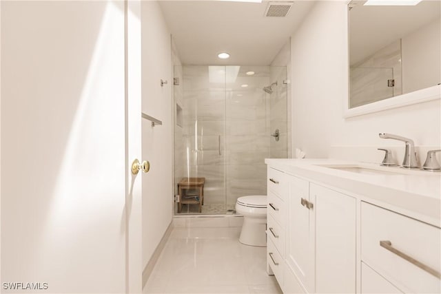 bathroom with toilet, tile patterned flooring, an enclosed shower, and vanity