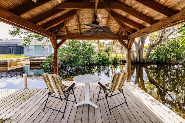 dock area featuring a gazebo and a water view