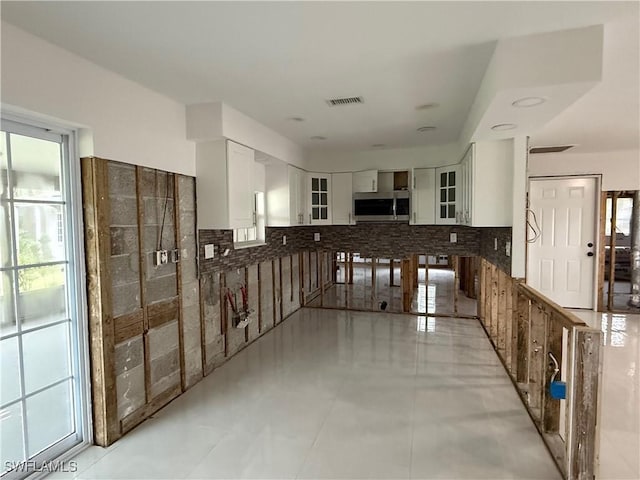 kitchen featuring white cabinetry