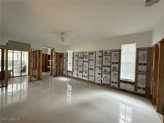 miscellaneous room with ceiling fan and a mail area