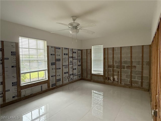 spare room featuring ceiling fan