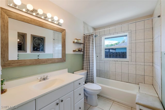 full bathroom featuring vanity, shower / tub combo with curtain, tile patterned floors, and toilet