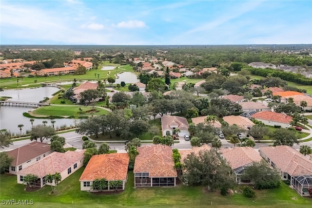 drone / aerial view with a water view