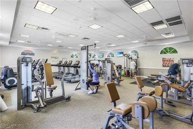 gym with a drop ceiling