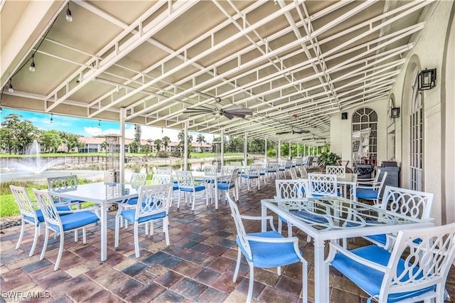 view of patio featuring a water view