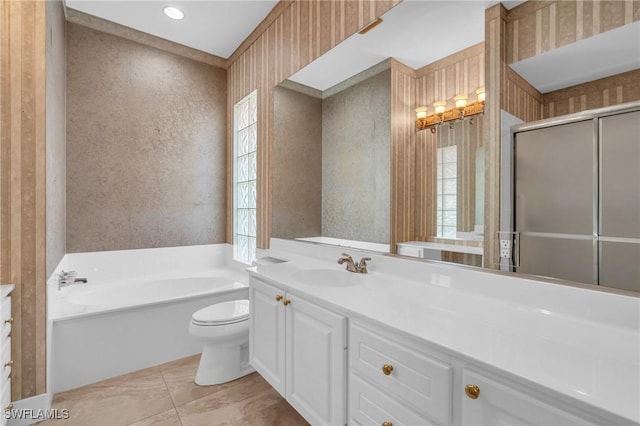 full bathroom with vanity, tile patterned floors, independent shower and bath, and toilet