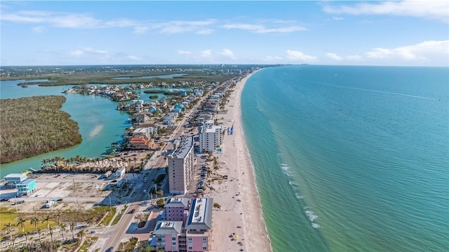 drone / aerial view with a water view and a view of the beach