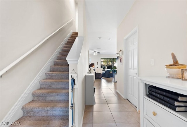 staircase with tile patterned flooring