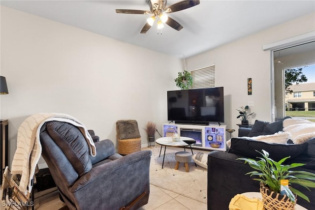 tiled living room with ceiling fan