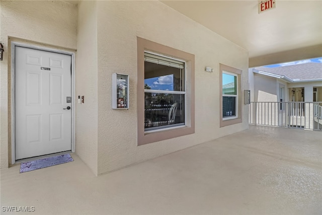 property entrance with a patio